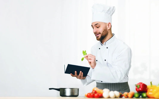 Food hygiene supervisor training kitchen staff on safe food handling practices and food hygiene certificate requirements in Spain for 2026.