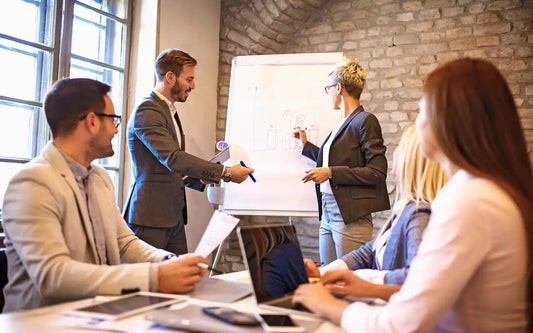Corporate presentation in a modern office detailing Spanish Data Protection Authority (AEPD) guidelines and GDPR rules for businesses.