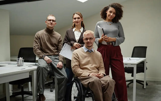 Company Equality Plan renewal guide banner featuring a diverse corporate team including a professional in a wheelchair