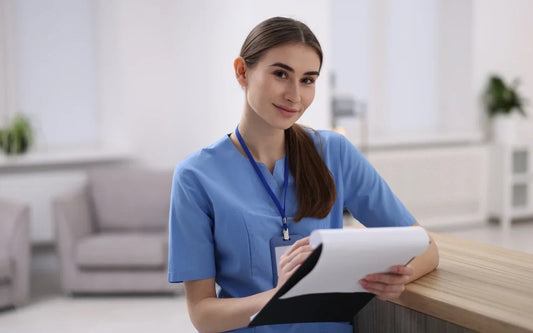 LOPDGDD-RGPD Compliance in Spanish Healthcare banner showing a medical worker with a clipboard at a reception desk